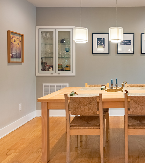 Photo of dining table with pendant lights